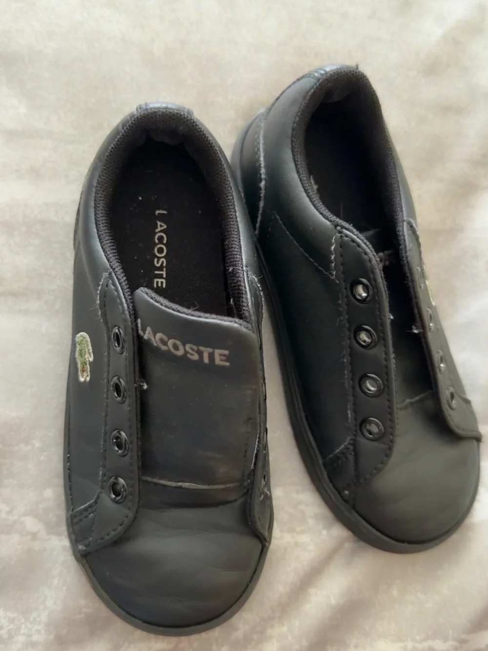 Kid’s Lacoste Black Slip-On Leather Sneakers with Green Croc Emblem